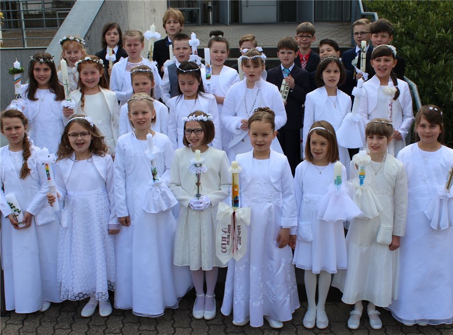 27 Kinder empfingen das Sakrament
der Ersten Heiligen Kommunion